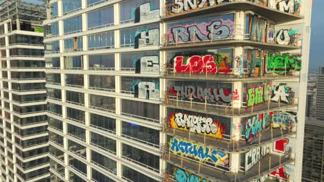 4K-Aerial-of-Graffiti-Tower-in-DTLA-in-February-2024,-Los-Angeles,-California,-USA