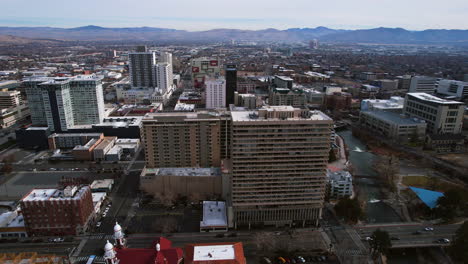 Reno-Nevada-USA,-Aerial-View-of-Downtown-Condo-Buildings,-Saint-Thomas-Aquinas-Cathedral-and-Street-Traffic