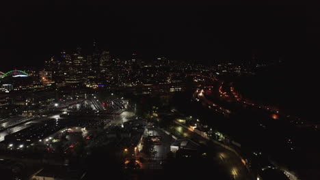 Seattle-night-time-aerial-shot-of-skyline-and-freeway