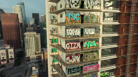 4K-Aerial-of-Graffiti-Tower-in-DTLA-in-February-2024,-Los-Angeles,-California,-USA