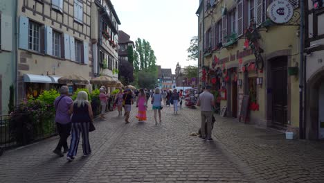 La-Petite-Venise-district-in-Colmar-cobble-streets-are-filled-with-tourists-and-locals
