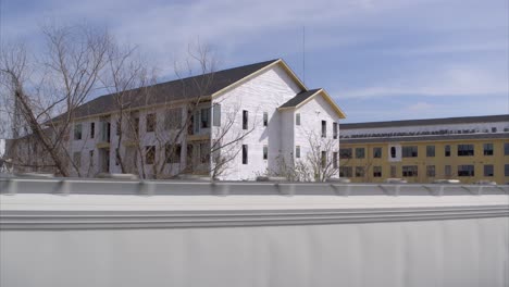 Drone-view-of-new-housing-construction-as-train-passes-by