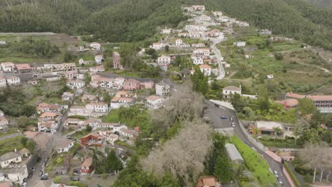 Drone-shot-of-city-in-the-mountains