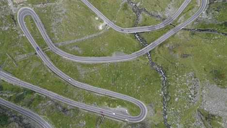 Transfagarasan-Hairpin-Turns-at-Mountain-Road-in-Carpathians,-Romania,-Europe---Aerial-4k-Birdseye