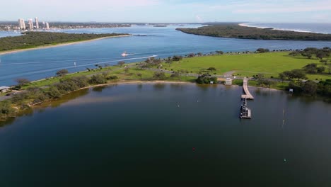 Right-to-left-aerial-views-over-The-Spit-and-the-Broadwater-on-the-Gold-Coast,-Australia