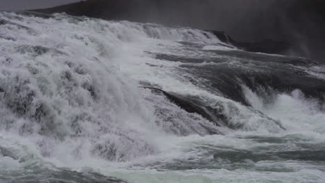 Powerful-Gullfoss-Waterfall-Cascades,-Iceland,-Close-Up-Slow-Motion-Panorama