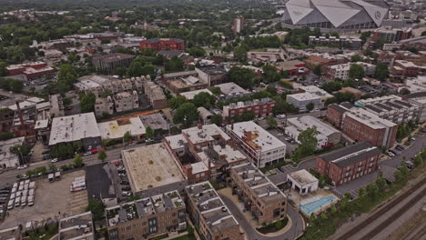 Atlanta-Georgia-Aerial-v916-birds-eye-view,-flyover-Castleberry-Hill-neighborhood-capturing-residential-lofts,-tilt-up-reveals-downtown-and-midtown-cityscape---Shot-with-Mavic-3-Pro-Cine---May-2023