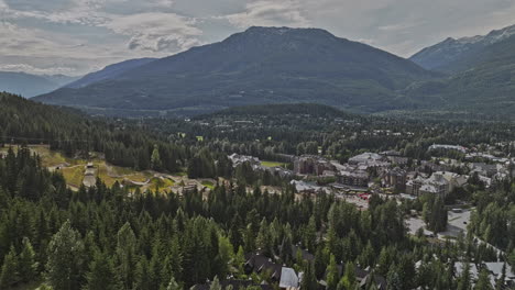 Whistler-BC-Canada-Aerial-v1-drone-flyover-Blackcomb-Park-towards-the-town-center-capturing-picturesque-resort-village-nestled-amidst-the-forested-mountains---Shot-with-Mavic-3-Pro-Cine---July-2023
