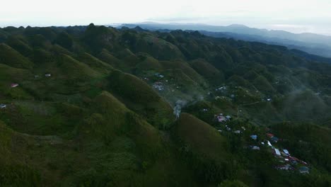 Misty-morning-aerial-view-of-Osmena-Peak,-Philippines-with-lush-greenery