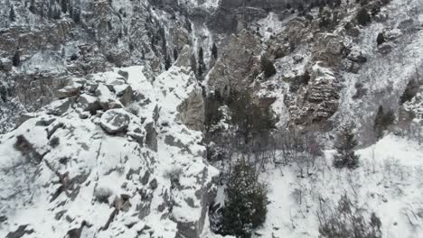 Flying-Above-Snowy-American-Fork-Canyon-In-Wasatch-Mountains-Of-Utah-In-Winter