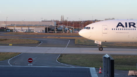 Long-haul-Air-France-jet-taxiing-to-runway-for-takeoff,-Charles-de-Gaulle-Airport