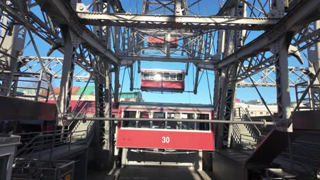 "Cabin-30"-starting-a-new-ride-at-the-Giant-Wheel-of-Vienna-Prater-Amusement-Park,-Austria---December-2023