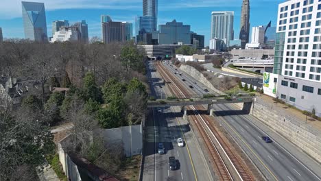 Busy-highway-in-front-of-Skyline-at-sunny-day