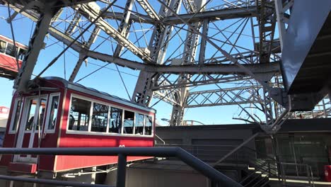 "Cabin-28"-arriving-to-the-end-of-the-ride-of-the-Giant-Wheel-at-Vienna-Prater-Amusement-Park,-Austria---December-2023