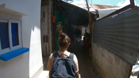 Walking-through-a-vibrant-Philippine-beachside-market-with-colorful-stalls