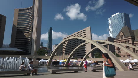 Wide-summer-establishing-shot-of-Nathan-Phillips-Square-in-Toronto