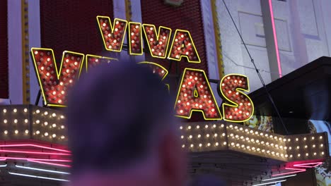 Flashy-neon-Viva-Vegas-sign-at-night-at-Fremont-Street-Experience,-Las-Vegas