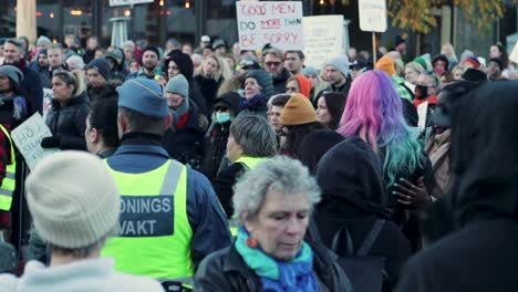 Crowded-demonstration-with-activists-holding-signs-for-women's-rights-in-Stockholm