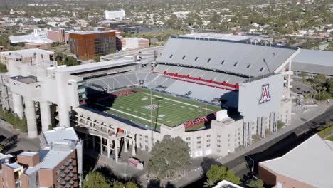 Arizona-Stadium-on-the-campus-of-the-University-of-Arizona-in-Tucson,-Arizona-with-drone-video-moving-down-in-parallax