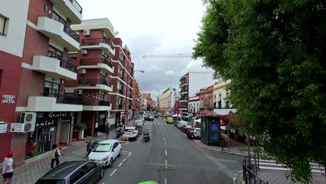 Driving-POV-exploring-beautiful-streets-of-Seville-Spain-shops-and-businesses