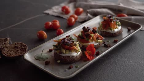 It-is-often-accompanied-by-local-products-such-as-olive-oil,-feta-cheese,-tomatoes,-and-herbs