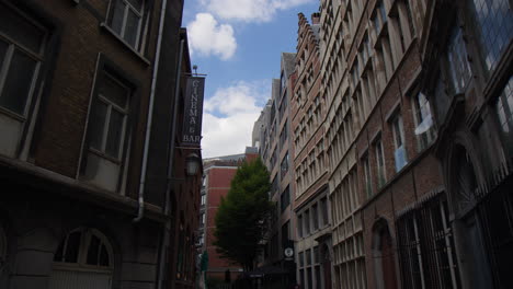 Discovering-Kaasstraat-in-Antwerp,-Belgium,-Europe---Drone-Flying-Forward