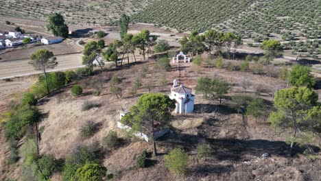 Perched-On-The-Hillside,-La-Ermita-Del-Poblado-De-San-Julián-Stands-As-A-Revered-Architectural-And-Religious-Icon