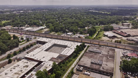 Atlanta-Georgia-Aerial-v980-flyover-West-End-towards-Adair-Park-capturing-residential-neighborhoods,-Beltline-light-rail-trail-and-cityscape-on-the-skyline---Shot-with-Mavic-3-Pro-Cine---August-2023