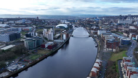 Newcastle-Upon-Tyne,-High-Wide-slowly-tracking-backawards-from-Millenium-Bridge-with-Newcastle-Icons-in-view