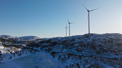 Wind-Power-Generators-in-Bessaker,-Norway-Pan-Down-Shot