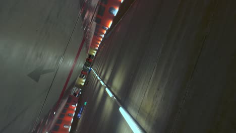 Empty-underground-car-parking-lot-orbit-vertigo-wide-angle-travel-shot