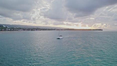 Catamaran-Sailing-at-Sunset-Las-Terrenas,-Dominican-Republic