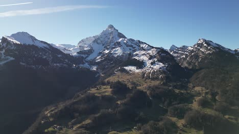Amden-Weesen-Switzerland-sideway-flight-of-mountains-and-forest-in-the-Alps