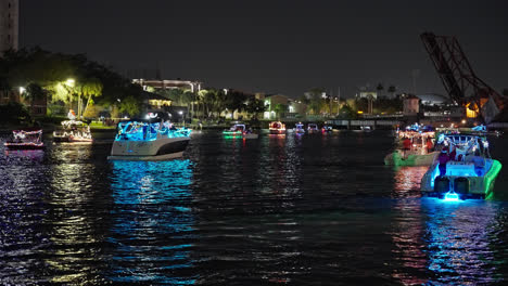 Boats-Decorated-With-Colorful-Lights-During-The-Yearly-Christmas-Parade-In-Tampa,-Florida,-USA