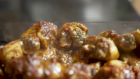 The-sight-of-steam-rising-off-freshly-cooked-chicken-meat,-showcased-in-a-close-up-bowl-shot,-evokes-the-anticipation-of-delicious-food-preparation