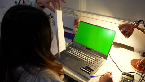 Student-girl-in-a-video-call-preparing-the-exam-with-particular-teacher