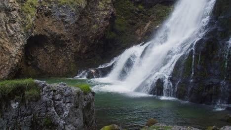 Wonderful-bottom-of-large-Golling-waterfall-in-Austria,-splashing-against-rocks