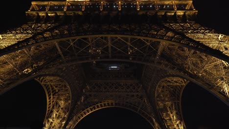 Bottom-of-Eiffel-Tower-at-Night-in-Tour-Eiffel-Garden