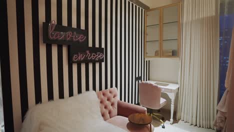 Home-Interior-With-Black-And-White-Vertical-Striped-Wallpaper-And-Lavie-en-Rose-Wall-Decor