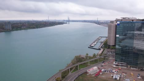 An-aerial-flying-over-the-Detroit-river-in-downtown-Detroit