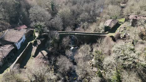 High-angle-aerial-panoramic-dolly-across-Navea-bridge