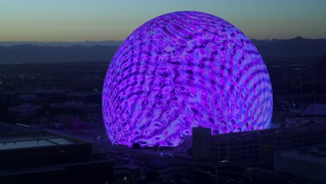 Sphere-Las-Vegas-at-dusk-with-colorful-lights-looks-like-ripples-of-water