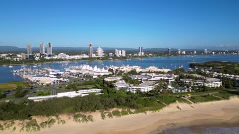 Left-to-right-aerial-views-over-Sheraton-Grand-MIrage-looking-towards-Southport,-Gold-Coast,-Australia