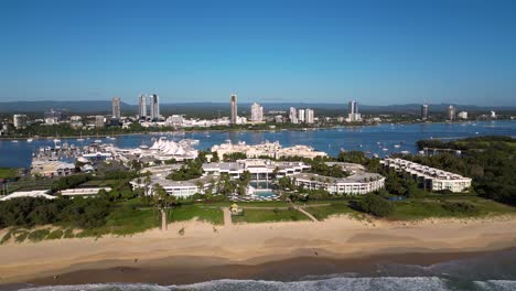 Left-to-right-aerial-views-over-Sheraton-Grand-MIrage-looking-towards-Southport,-Gold-Coast,-Australia