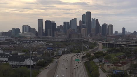Drone-shot-from-I-10-West-of-the-downtown-Houston,-Texas-area