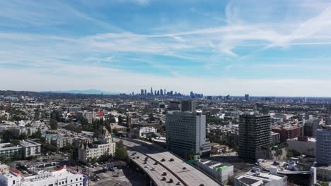 Drone-shot-showing-the-busy-highway-coming-into-los-angeles,-california