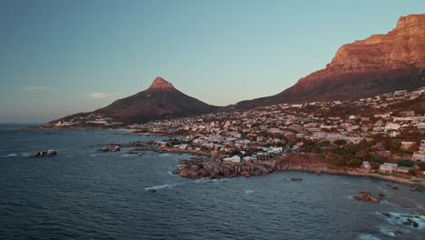 Suburbs-At-Camps-Bay-In-Cape-Town-With-Lions-Head-Mountain-In-South-Africa---Aerial-Drone-Shot
