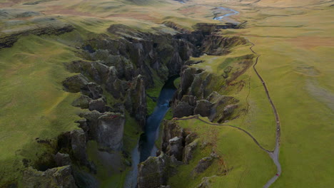 Canyon-Fjadrargljufur-Valley-Landscape-In-South-Iceland-At-Sunset---Drone-Shot