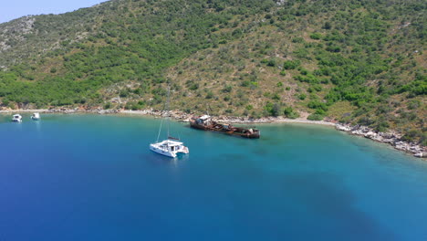 Aerial:-Beautiful-Alonnisos-shipwreck-on-Peristera-island,-Sporades,-Greece-during-summer