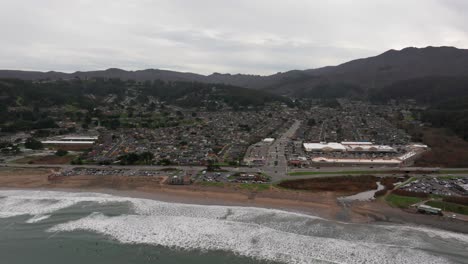 Drone-aerial-view-of-Pacifica,-California-town-and-beach